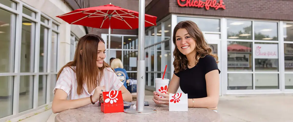 Students enjoying Chick-fil-A outside