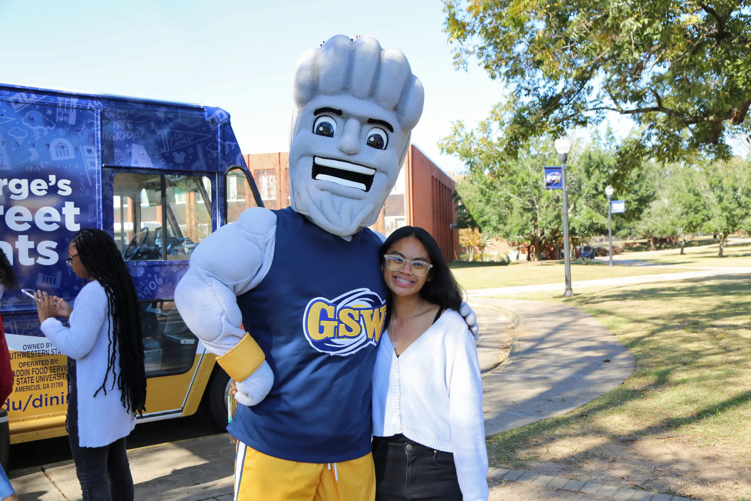 GSW mascot and student